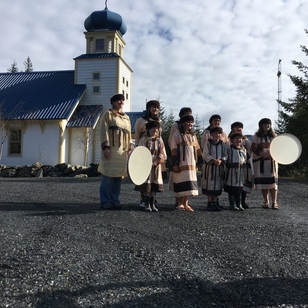 Image of young people in traditional clothing